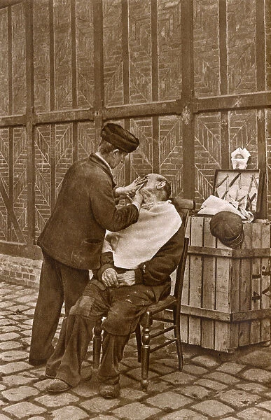 Barber in action, Rouen, Normandy, Northern France