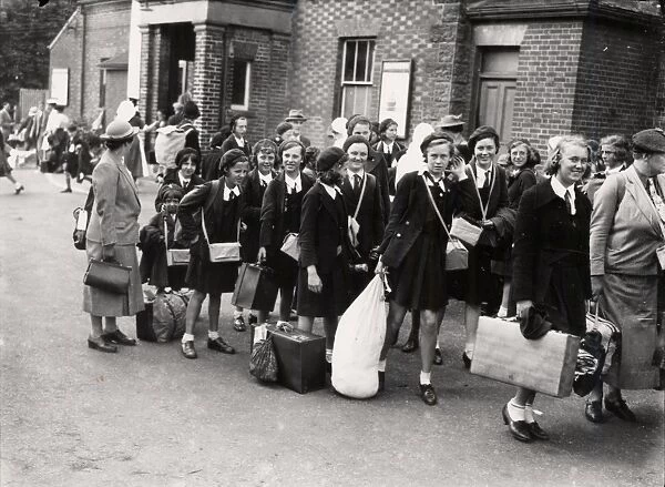 Evacuees leaving hall, September 1939