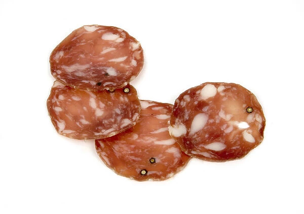 Salami secchi slices on white background