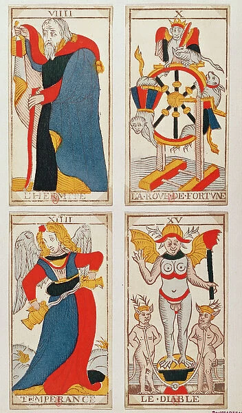 Four Tarot cards depicting The Hermit, The Wheel of Fortune