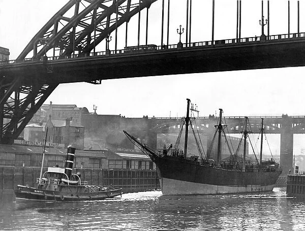 The four-masted Barque sailing ship Archibald Russell sailing under the Tyne Bridge