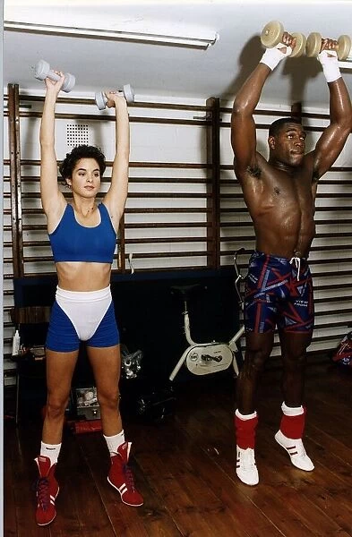 Frank Bruno traing in gym with Emma Isickel