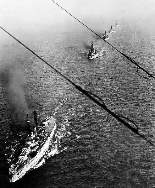 The German High Seas Fleet being escorted to Scapa Flow by a US battleship after