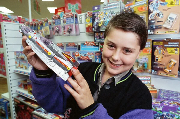 Rocketing success... Gavin Thompson, 13, shows off the starblaster spaceship he invented