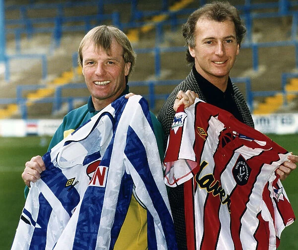 Sheffield United football manager Dave Bassett stands with Sheffield Wednesday manager