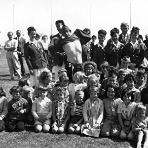 Children and Redcoats at Butlins holiday camp