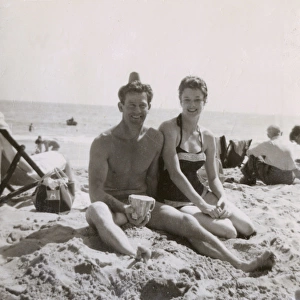 Couple on the beach at Bournemouth - early 1960s