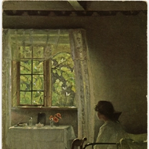 Girl seated on her bed awoken by the morning sun