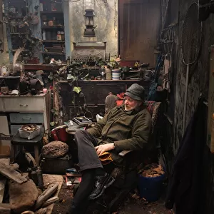 A man sits in his shed - Kirkcudbright, SW Scotland