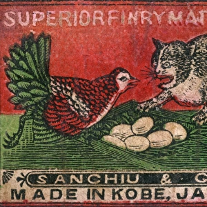 Old Japanese Matchbox label with a cat and hen fighting