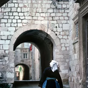 An old woman wearing traditional costume, Dubrovnik