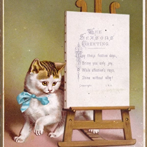 Tabby and white cat on a Christmas card
