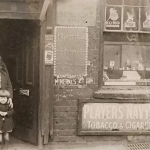 Woman and girl outside a shop, Handsworth, Birmingham