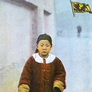 Young Chinese boy in traditional costume