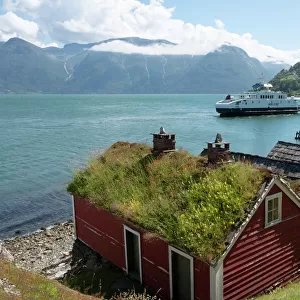 A ferry leaving the village of Utne on Hardanger Fjord, Vestlandet, Norway, Scandinavia