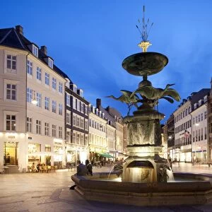 Restaurants and fountain at dusk, Armagertorv, Copenhagen, Denmark, Scandinavia, Europe