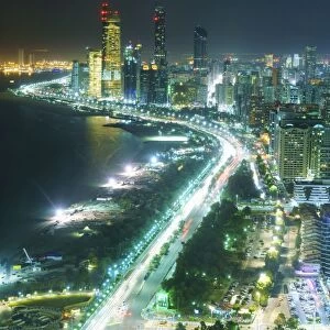 Skyline and Corniche, Al Markaziyah district by night, Abu Dhabi, United Arab Emirates