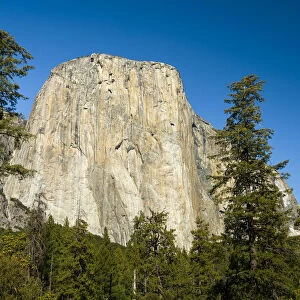 Low angle view of El Capitan summit against clear sky at Yosemite National Park on sunny