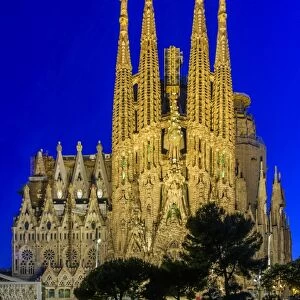 Night view of the Nativity facade of Sagrada Familia basilica church, Barcelona, Catalonia