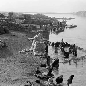IRAQ: TIGRIS RIVER, c1932. Washing wool in the Tigris River in Mosul, Iraq, c1932