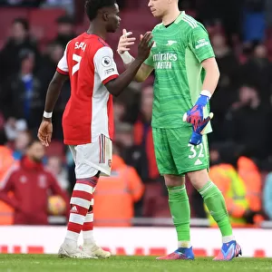 Arsenal's Saka and Ramsdale: Unstoppable Victory Duo Celebrate Against Brentford