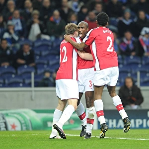 Sol Campbell's Goal Celebration with Bendtner and Diaby: Arsenal's Victory Moment against FC Porto in the UEFA Champions League