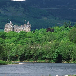 Great Britain, Scotland, Perthshire, Pitlochry, Atholl Palace Hotel, view of loch and woodland forest with castle in the distance