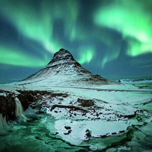 Aurora borealis over Kirkjufell during the night in Iceland