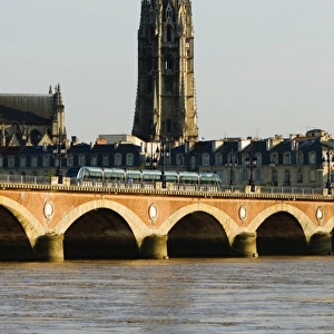 Cable car on a bridge, Pont De Pierre, St. Michel Basilica, Garonne River, Bordeaux, Aquitaine, France