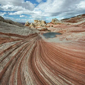 Small pool and geological formations found at Vermillion Cliffs National Monument, Arizona, USA