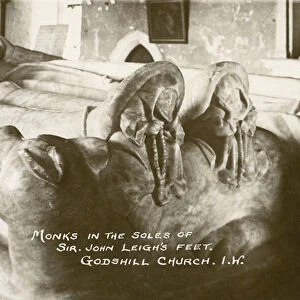 Monks in the soles of Sir John Leighs feet, Godshill Church, Isle of Wight, England (b / w photo)