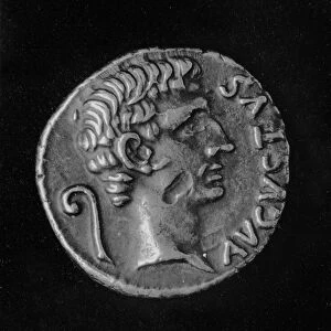 Portrait of Emperor Augustus (63BC-14AD), on the reverse side of a coin of Julia