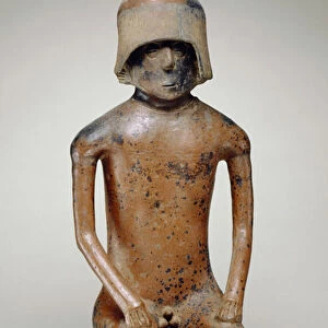 Seated male with helmet (earthenware)