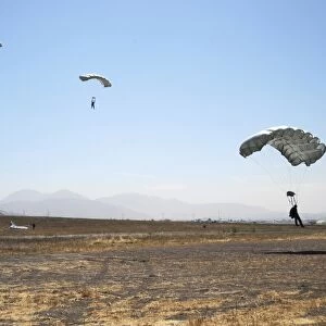 Freefall parachute jumpers approaching the Trident drop zone in San Diego