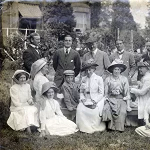 Wightman family and friends group of 14 individuals in unknown garden setting, c. 1910