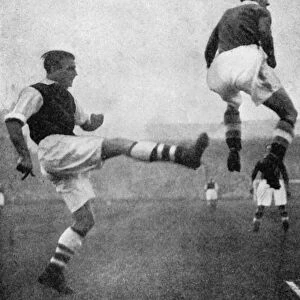 Action from an Arsenal v Chelsea football match, c1936-c1944. Artist: Sport & General