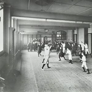 Boys and girls playing netball, Cable Street School, Stepney, London, 1908