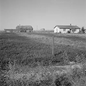 The Emmett Smith house, one of the best of the flat, Dead Ox Flat, Malheur County, Oregon, 1939. Creator: Dorothea Lange