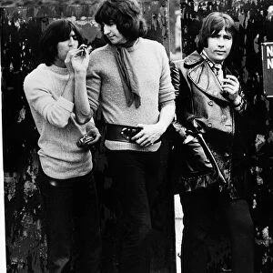 British Sixties pop group The Troggs smoking next to no smoking sign