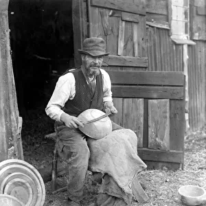 George Lailey, the old bowl turner of Bucklebury who turns bowls from elm logs on a