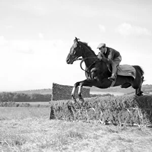 Jockey Fred Winter working out on the Downs. 15th July 1954