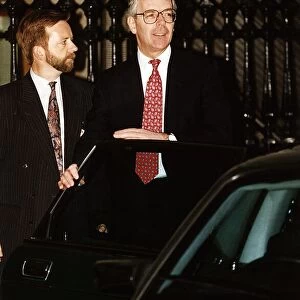 John Major MP (R) leaving the Scott Enquiry in 1994