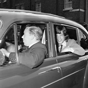 Mick Jagger of the Rolling Stones leaves brixton jail driving along the private road