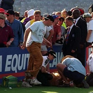 Pantomime cow after being tackled at Headingley July 1997 Medical Staff treat Brancha
