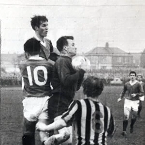 Player manager Jock Wallace clears from mclean and forrest at Berwick circa 1965