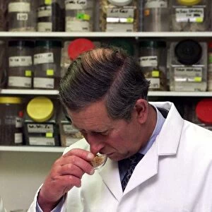 Prince Charles makes Herbal Medicine at University of Westminster. Wearing lab coat