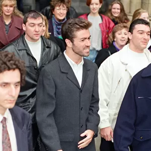 Singer George Michael leaving the High Court after the law suit against Sony