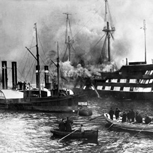 The training ship Wellesley on fire in the Tyne in 1914