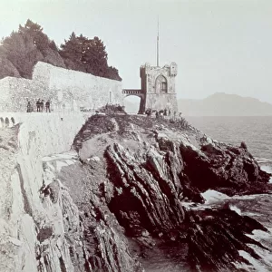 Gropallo Tower in the Park of the Gropallo Villa, in Nervi. Below, the sea lapping the rocks on which the tower stands